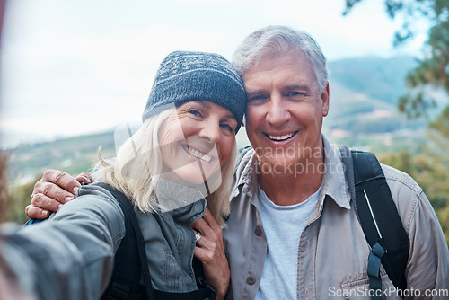 Image of Old couple, selfie and portrait, hiking in forest and happy people in nature and memory for social media post. Smile in picture, adventure and fitness, man and woman with active lifestyle and outdoor