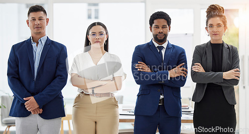 Image of Business people, portrait and serious team with arms crossed in confidence for leadership at the office. Diversity, men and women in corporate management, teamwork or company mission at the workplace