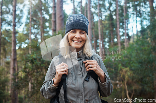 Image of Happy, hiking and portrait of old woman in nature for relax, trekking and adventure. Travel, wellness and vacation with female walking in forest for retirement, backpacking and cardio endurance