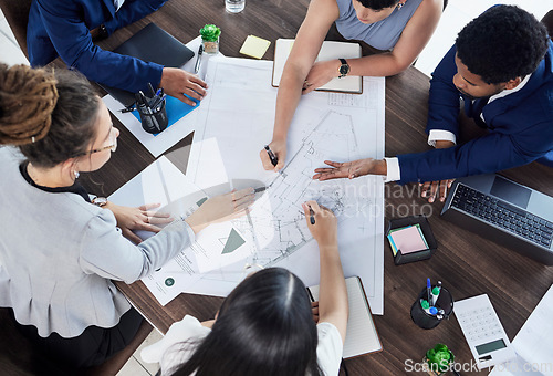 Image of Business people, hands and planning construction above in meeting for team collaboration at office. Hand of architect group in teamwork strategy, brainstorming or discussing floor plan at workplace