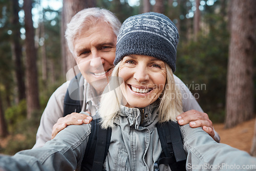 Image of Senior couple, selfie and portrait, hiking in forest and happy people in nature and memory for social media post. Smile in picture, adventure and fitness outdoor, man and woman with active lifestyle