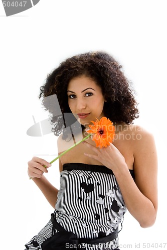 Image of Young girl with flower