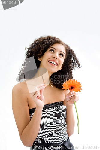 Image of Young girl with flower