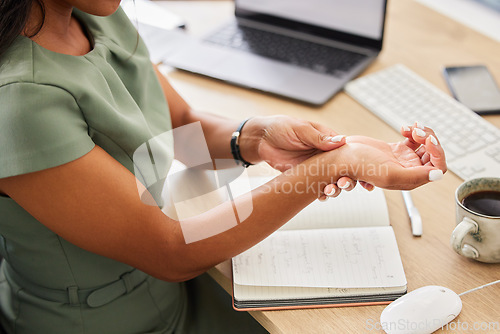 Image of Business woman, wrist injury and pain from osteoporosis, orthopedic joint and working in office. Female employee, carpal tunnel and hands of health risk, arthritis and muscle fatigue of fibromyalgia