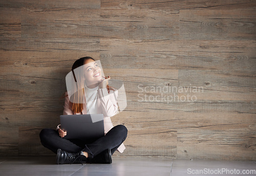 Image of Happy woman, thinking and laptop with space for idea for advertising or mockup. Smile of female on wooden background for internet connection for computer search, promotion or student scholarship