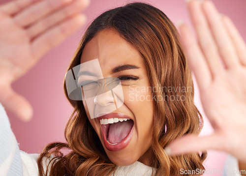 Image of Wow, hands and selfie of woman excited in studio, announcement or good news of sale on pink background. Face, frame and girl cheerful, shocked and surprised by discount, promotion or photo