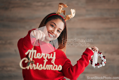 Image of Christmas sign, happiness and woman portrait with xmas and festive season decorations. Wow, excited and isolated female with holiday celebration and a smile from winter celebrating and youth