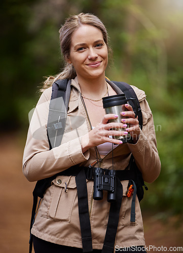 Image of Hiking, coffee or portrait of woman in nature, forest or wilderness for trekking adventure or freedom. Smile, fun or happy hiker walking in natural park or woods for exercise or wellness on holiday