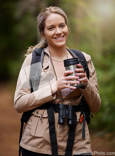 Image of Hiking, coffee or portrait of happy woman in nature, forest or wilderness in trekking adventure or freedom. Smile or excited hiker walking in natural park or woods for exercise or wellness on holiday