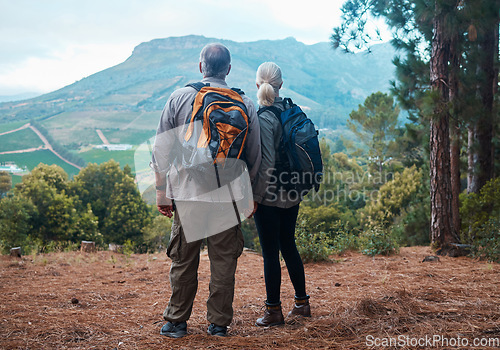 Image of Mountains, retirement and hiking, old couple holding hands from back on nature walk and mountain in view in Peru. Travel, senior man and woman on cliff, hike with love and health on holiday adventure