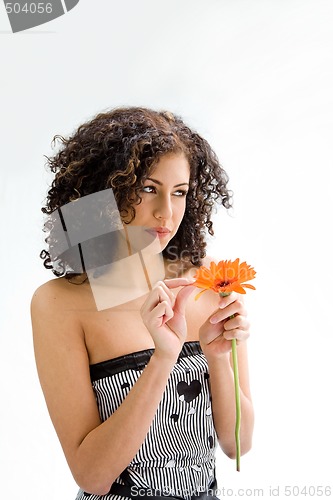 Image of Young girl with flower