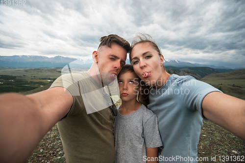 Image of Selfie of family in mountain