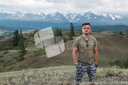 Image of Relaxing man in Kurai steppe on North-Chui ridge