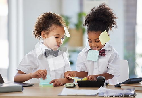 Image of Children, together and playing office with sticky note at desk with happiness, brainstorming and teamwork. Kids, girl and group with paper, planning and play as business people for bond with games
