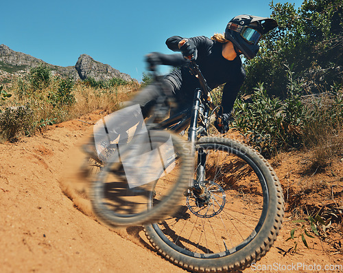 Image of Cycling, fast and extreme sports with man on mountain bike for adventure, fitness and adrenaline junkie. Exercise, risk and motion blur with male athlete in nature for workout, training and speed