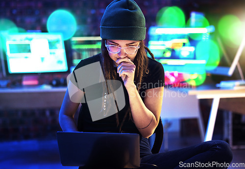 Image of Laptop, woman and hacker thinking in home for programming, software or cybersecurity. Neon, computer and female coder or programmer reading information for hacking idea while on dark web at night.