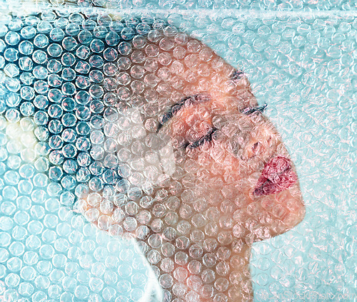 Image of Beauty, plastic and makeup with black woman and bubble wrap for package, creative and cosmetics. Self care, confidence and youth with girl model and red lipstick for facial, art and glow in studio