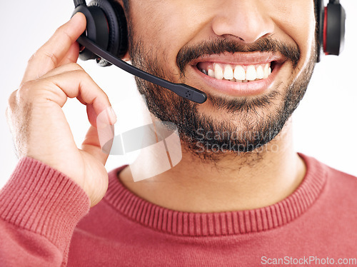 Image of Call center consulting, mouth or happy man telemarketing on contact us CRM or telecom studio. Customer service communication, face headset mic and male consultant smile isolated on white background