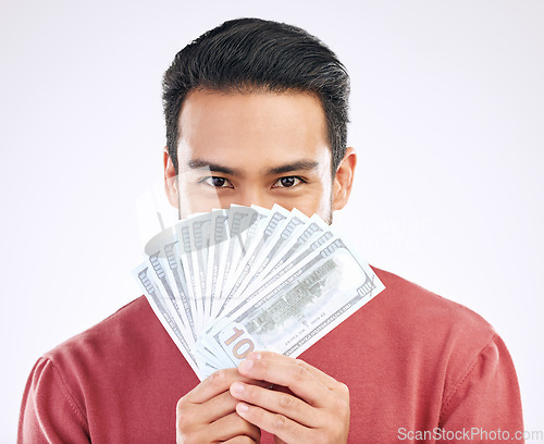 Image of Money fan, cash and portrait of man on white background for investment, financial savings and payment. Finance profit, winner and isolated male for winning, prize and stock market success in studio