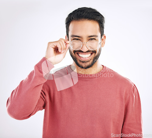 Image of Glasses, happy man and portrait in a studio with a smile from vision and eyewear choice. Isolated, white background and happiness of a excited male model with lens prescription and frame decision