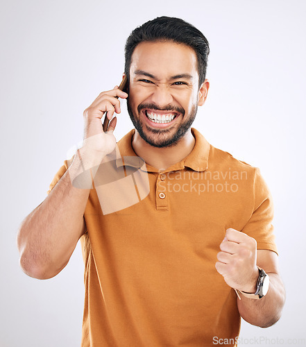 Image of Phone call communication, portrait and happy man celebrate achievement, success news or studio winning. Excited, winner or male celebration fist pump, announcement or notification on white background