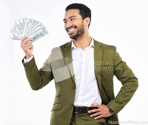 Image of Investment, money and business man with cash on studio background for budget, bonus and stock market. Finance success, winner and happy male with bills for winning, bank profit and wealth opportunity