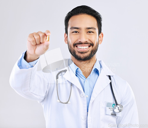 Image of Pharmacist portrait, studio pills or happy man with pharmaceuticals, drugs or medicine supplement. Healthcare support, medical pharmacy or male doctor with prescription medication on white background