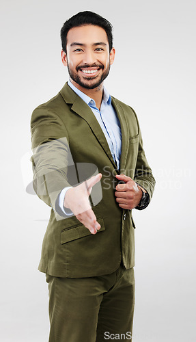 Image of Business portrait, happy man and studio handshake gesture for investment deal, b2b contract or acquisition agreement. Human resources, hiring welcome and HR hand shake isolated on gray background