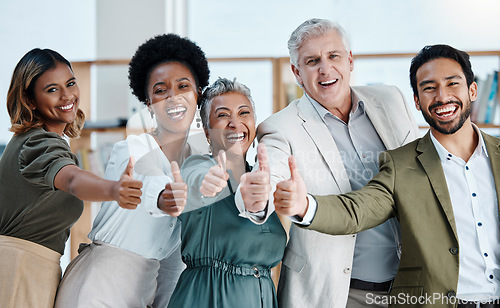 Image of Thumbs up, portrait and happy business people in office with thank you sign, gesture and positive symbol. Diversity, hands and face of team with finger emoji for cooperation, coworking and solidarity