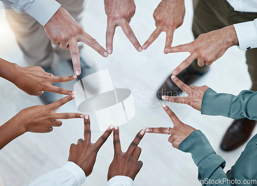 Image of Teamwork, support and hands of business people in peace sign for motivation, goals and mission in office. Collaboration, team building and top view of employees star for diversity, trust and success