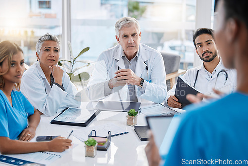 Image of Presentation, teamwork and doctors in meeting with documents for medical strategy, planning and consulting. Healthcare, collaboration and leader with people in discussion, talking and conference