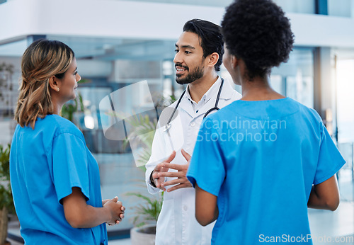 Image of Discussion, teamwork and doctors in meeting in hospital for medical strategy, diagnosis and treatment. Healthcare, collaboration and man doctor with nurses for consulting, planning or surgery results