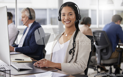 Image of Portrait, smile and woman in call center in office working on customer support in workplace. Telemarketing, mixed race person or happiness of sales agent, female consultant or telemarketer consulting