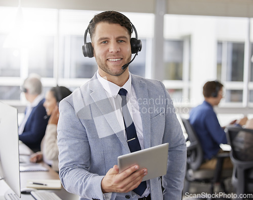 Image of Man, call center and tablet with smile in portrait, typing and crm for customer service, tech support or help. Male consultant, agent or contact us with happiness in workplace with mobile touchscreen