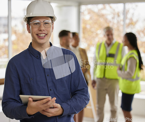 Image of Portrait, engineer and man with tablet, online planning and reading emails for schedule, deadline or network. Face, male employee or architect with staff, group or teamwork with success or leadership