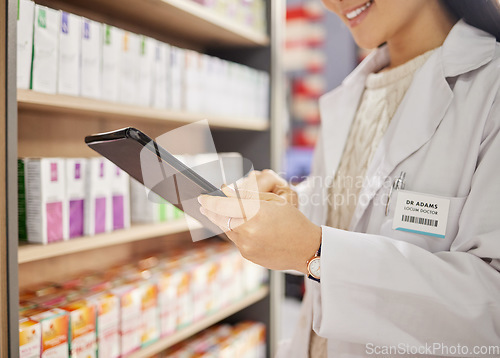 Image of Hands, tablet and stock in a pharmacy with a woman drugstore at work, checking shelves for a product. Healthcare, medicine and trust with a female pharmacist working in a store for the sale of drugs