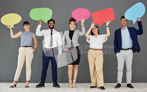 Image of Speech bubble, collaboration and portrait with business people in studio on a gray background for communication. Social media, teamwork and diversity with a group of happy colleagues showing mockup