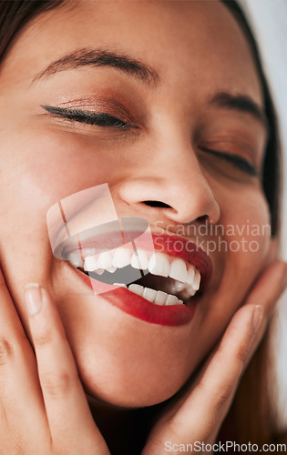 Image of Face closeup, woman laughing and makeup of a gen z, youth and female model with cosmetics. Laugh, carefree and natural beauty of a young person with skin textures and cosmetic care with self love