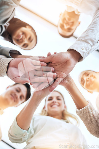Image of Business people, hands stack and circle with smile, team building and support for goals in workplace. Men, women and teamwork with solidarity for happiness, motivation and trust with diversity at job