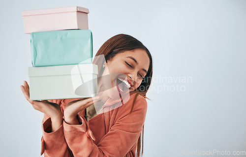 Image of Gift box, excited and studio woman with shopping sales product, discount fashion deal or mall store present. Commerce market, retail person and happy customer celebrate on mockup grey background