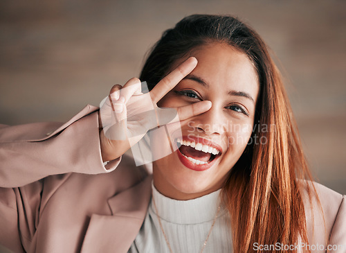 Image of Portrait, smile and woman with peace sign, excited and happiness with joy, carefree and cheerful. Face, female and happy lady with hand gesture, facial expression and emoji with v symbol and review