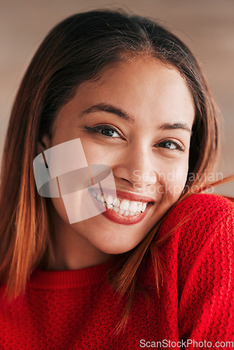 Image of Happy, beautiful and portrait of a young woman isolated on a studio background. Happiness, content and closeup of the face of a girl relaxing, looking comfortable and attractive on a bokeh backdrop