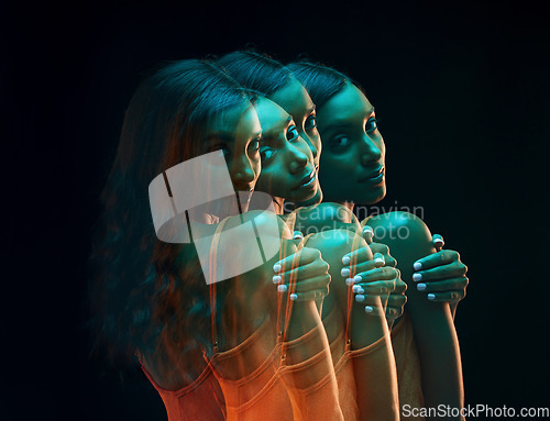 Image of Green light, fashion portrait and woman double exposure with beauty and art aesthetic. Creative neon lighting, young female and model with a dark background in a studio with modern style and fashion