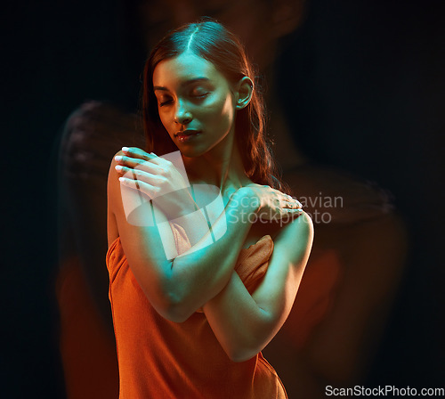 Image of Green light, double exposure and Indian woman with beauty, glowing skin and art. Creative lighting, young female and model with a dark background in studio with modern style and relax feeling