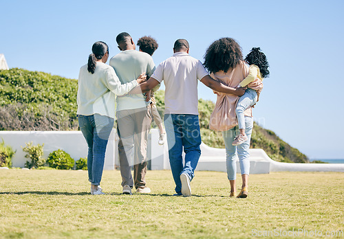 Image of Grandparents, parents and children walking in garden for bonding, quality time and relax together. Family, love and back of happy mother, father and kids enjoy holiday, summer vacation and weekend