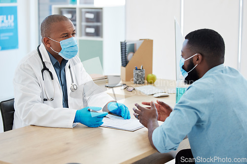 Image of Doctor, covid consultation and black man talking with patient for checkup or results in clinic. Healthcare, medical professional and African person consulting physician for advice with clipboard.