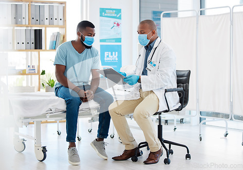 Image of Doctor, consultation and covid results on clipboard with black man for checkup, test or examination. Healthcare, medical professional and checklist for advice, diagnosis or information in clinic.