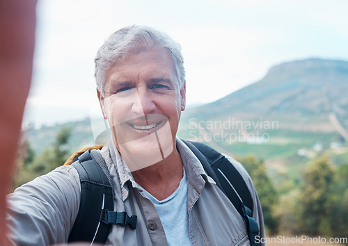 Image of Selfie, hiking and portrait of old man on mountain for outdoor adventure, freedom and wellness in nature. Retirement, traveling and happy senior male take picture on hike, trekking and summer holiday