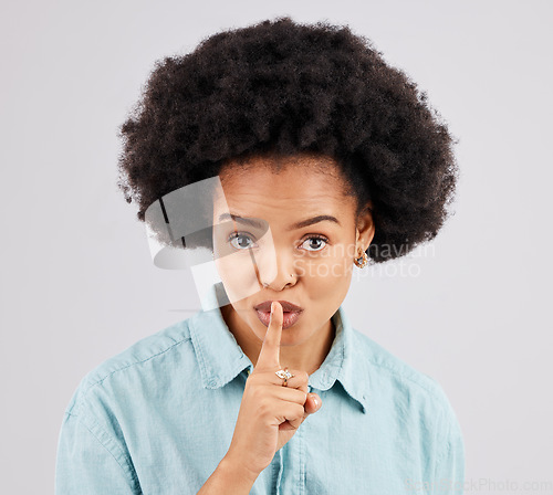 Image of Secret, portrait and woman with finger on lips in studio, white background and privacy sign. Face of female model, silence and shush for quiet, gossip and whisper emoji for confidential mystery news