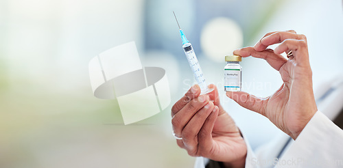 Image of Vaccine bottle, needle and hands of doctor in a medicare hospital getting ready for a monkeypox treatment. Healthcare, injection and closeup of a medical worker with a virus vaccination in a clinic.